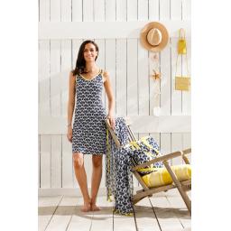 Pastunette Navy and Yellow Beach Dress on Model with chair.jpg