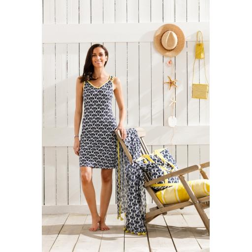 Pastunette Navy and Yellow Beach Dress on Model with chair.jpg